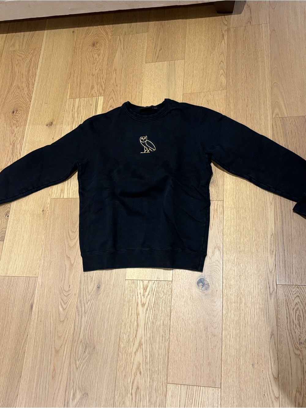 OVO Black Crewneck Sweater with Gold Owl Logo and grey sweatpants